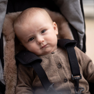Super soft lamb skin liner for stroller. Universal.